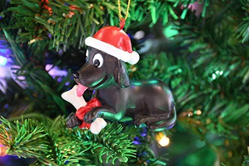 Првите Божиќни украси на кучињата од дрво кутре се присутни украси за кучиња