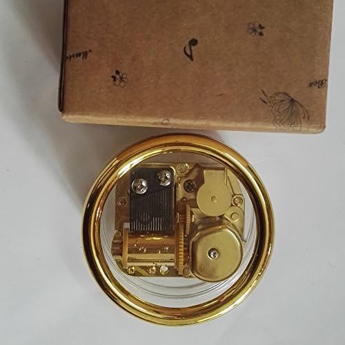 Креативна ветерна акрилна пластика Транспарентна музичка кутија со движење со злато, во разни форми музичка кутија, носејќи ве од замокот на