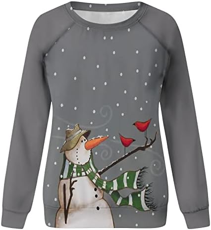Xiaojmake Божиќни жени врвови симпатични кошули за печатење на снежен човек, облечени со долги ракави, лабава маичка за џемпери, пулвер
